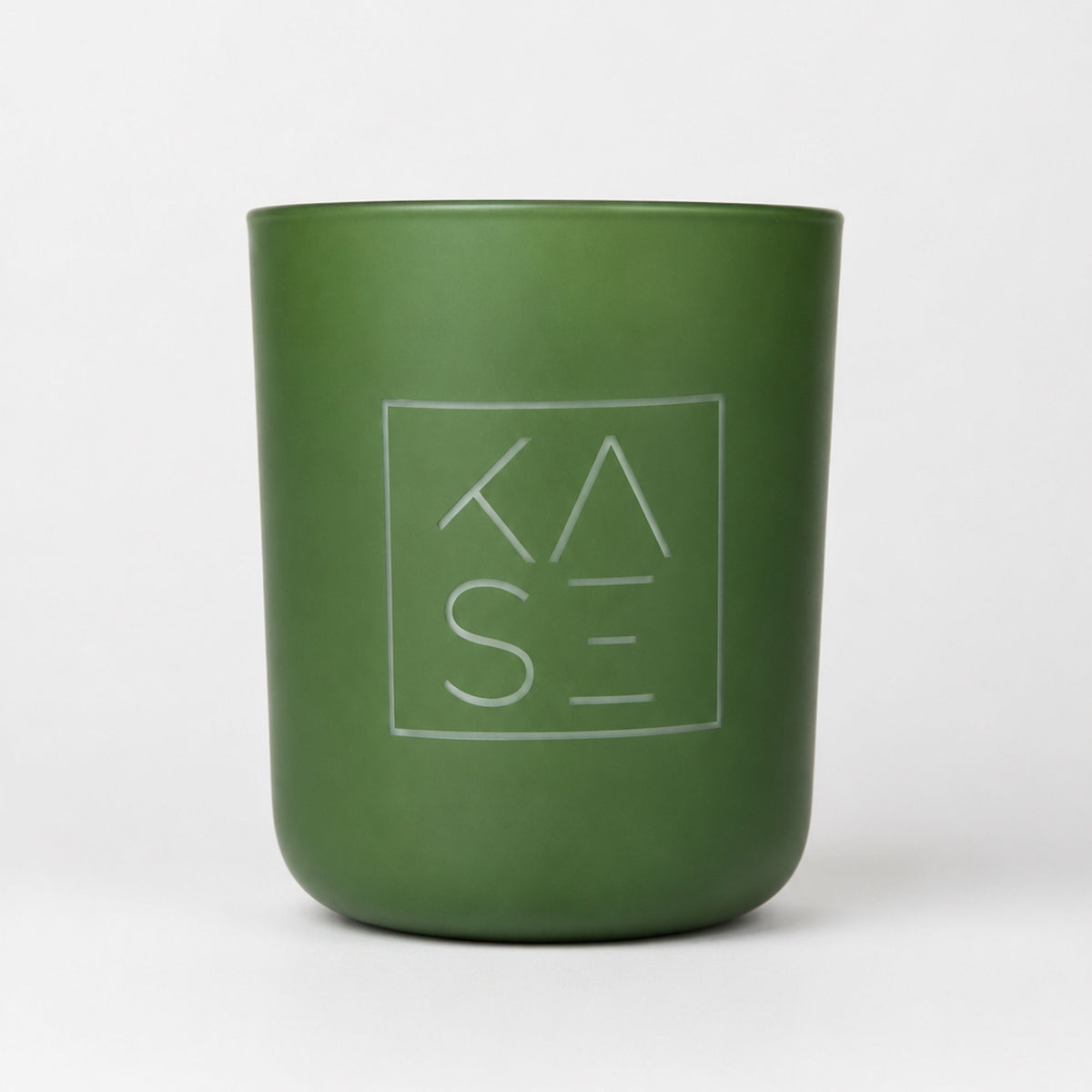 Back of the KASE Candle with the etched KASE square logo